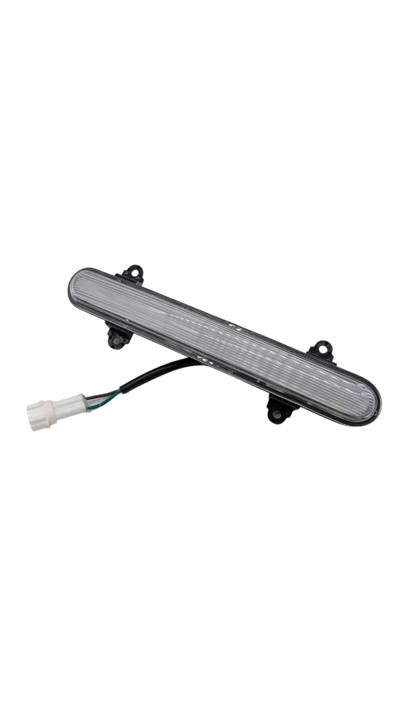 Luz EK3 lado derecho al lado del reposapiés